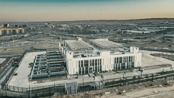 Aerial of a separate Waterfall campus at dusk