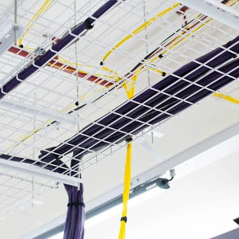 Overhead cable containment and fibre trays inside an iColo facility
