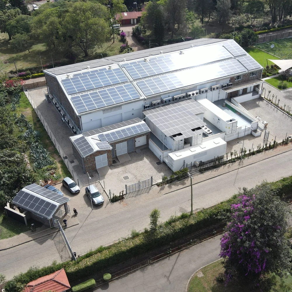 NBO1 at the Karen campus from the air, showing the rooftop solar array and the containerised plant yard